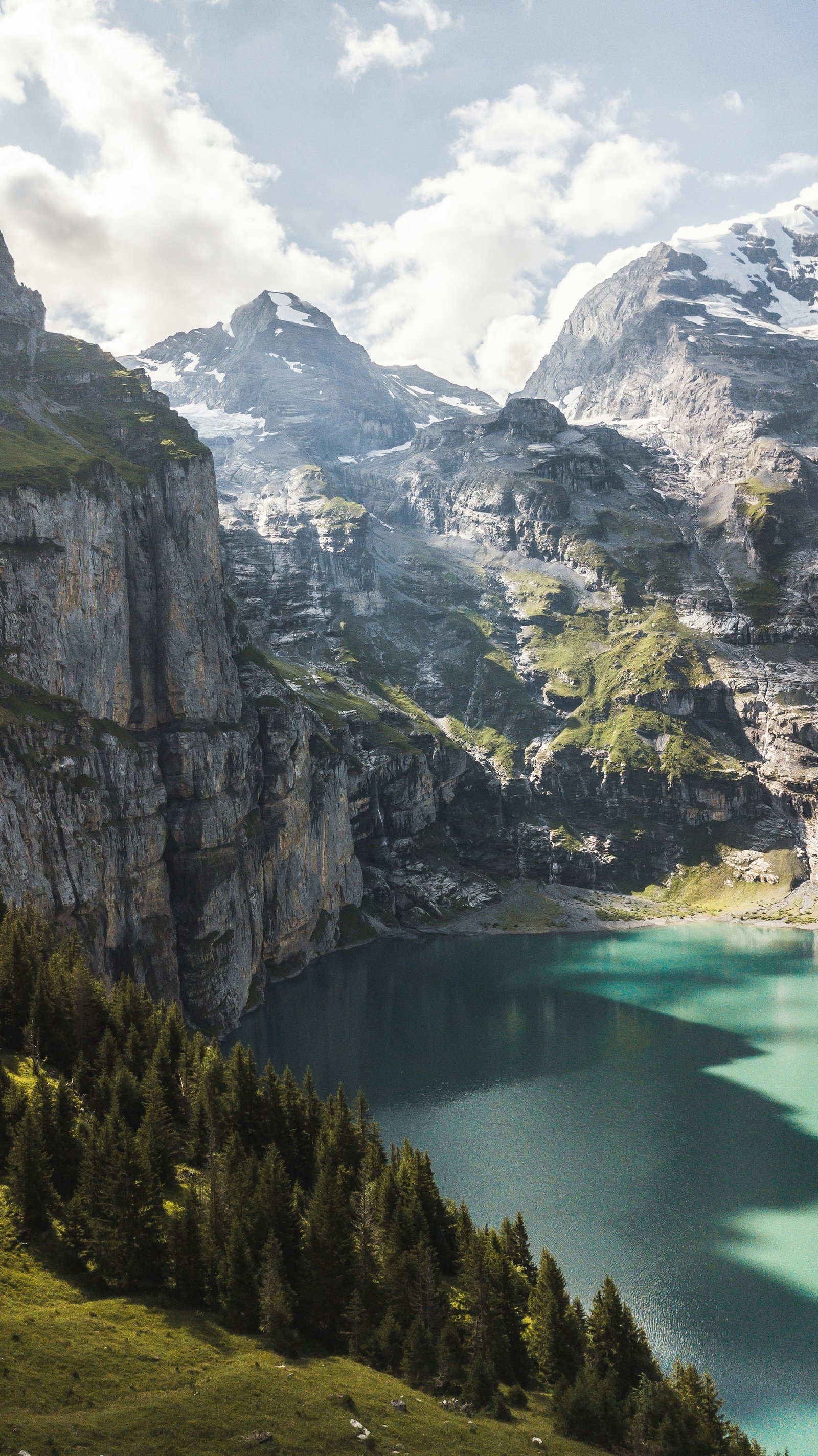 An Alpine lake beneath the mountains of Switzerland